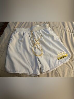 Rhude White Swim Shorts with Yellow Drawstring and Patch